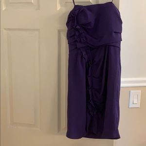 A strapless BCBGeneration purple dress.